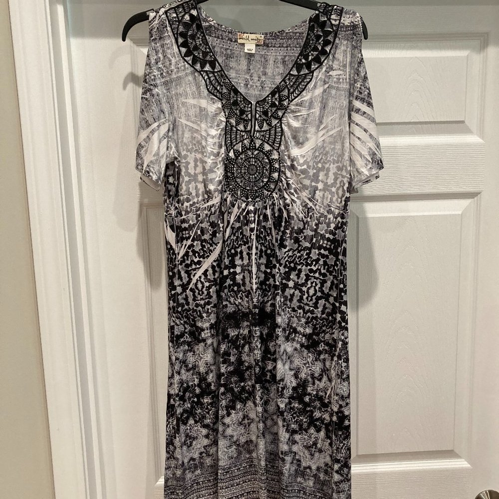 Black & White dress.  Size Medium.  Beaded details. Slit short sleeves.
